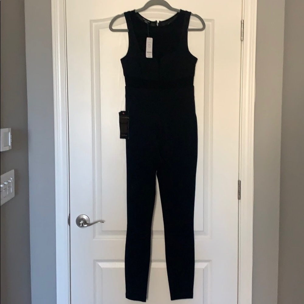 Brand new black BEBE jumpsuit